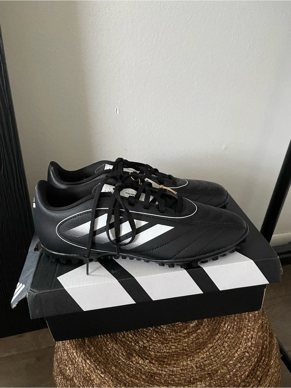 Adidas women’s Black Turf Soccer Shoes with White Stripes